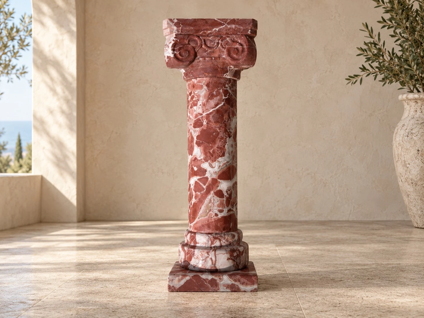 Klassische ionische Säule aus rot-weiß gemasertem Stein